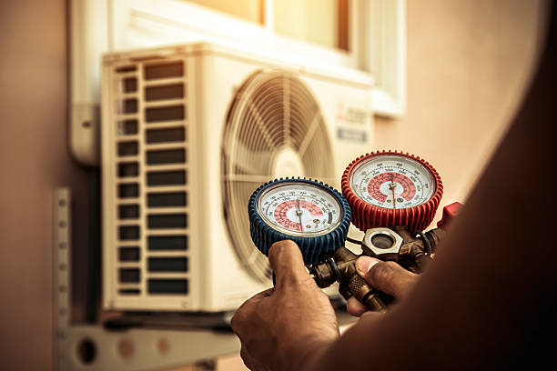 Professional Hvac technician working in Musella, GA